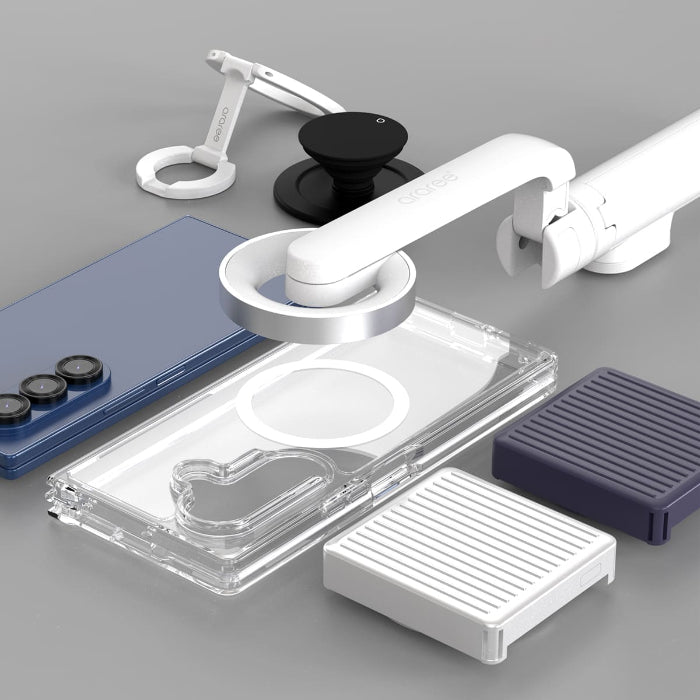 Collection of phone accessories including a Clear Araree Duple M Magnetic Case for Samsung Galaxy Z Fold 7 (2025) on a gray surface.