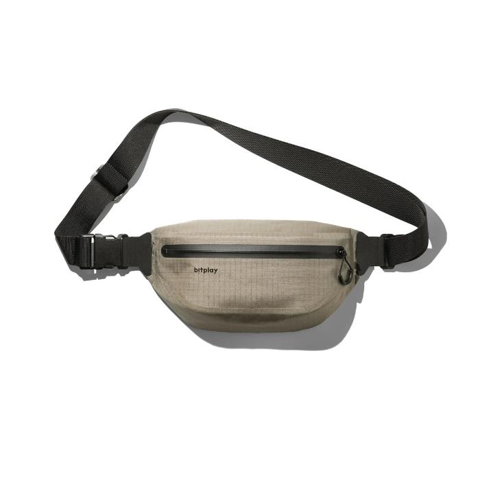 Sand Bitplay AquaSeal IPX7 Waterproof Sling Bag with Strap Adapter on a white background 