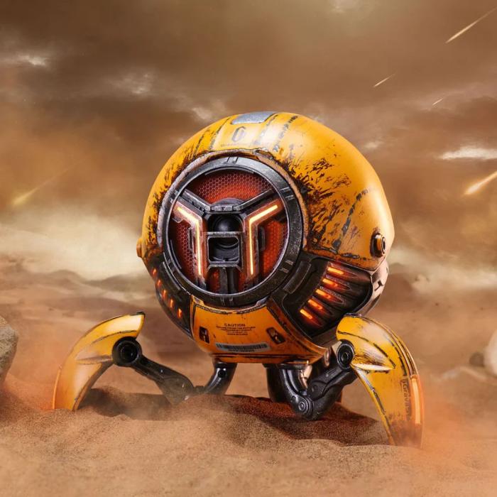 Yellow GravaStar G1 Pro Mars Pro Wireless Bluetooth 5.0 Speaker (War Damaged Edition) in a desert landscape with a stormy sky