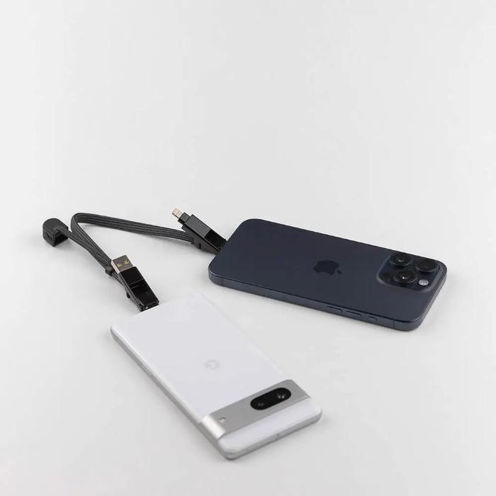 Black Rolling Square InCharge XL  6 in 1 KeyRing Size 100w Fast Charging and Data Cable connected to two devices at the same time on a white background